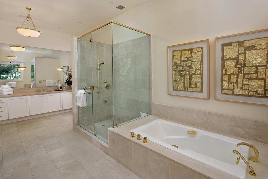 10 Faxon Forest Atherton, CA 94027 - Photo 8 of 16 a bathroom with a bathtub shower sink and mirror