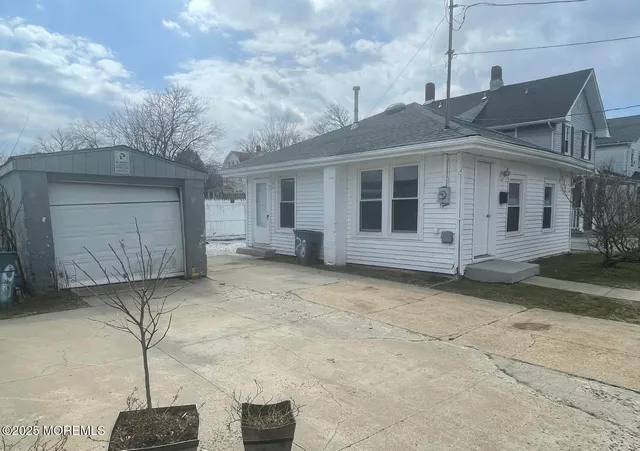 a front view of a house with a garage