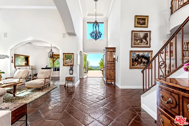 a view of entryway with a front door