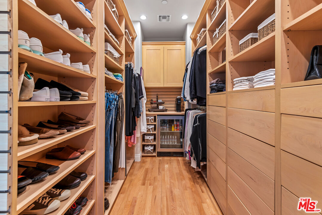 8018 Balcom Canyon Road Somis, CA 93066 - Photo 18 of 36 a view of walk in closet with clothes and shoes