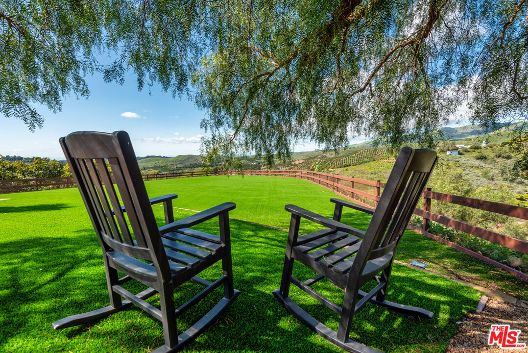 8018 Balcom Canyon Road Somis, CA 93066 - Photo 22 of 36 a view of a chairs in backyard of a house