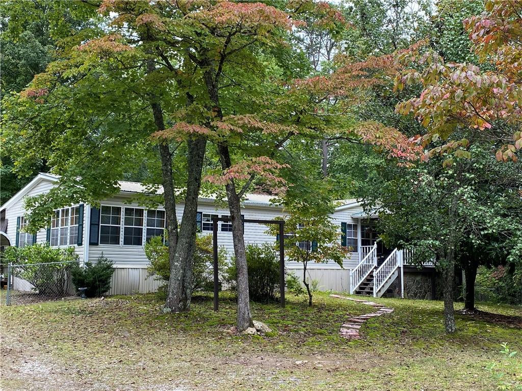 33 Yellowbird Trail Blue Ridge, GA 30513 - Photo 1 of 1 Very inviting on gorgeous 1.2 acre lot surrounded by nice homes just minutes from downtown and Lake Blue Ridge