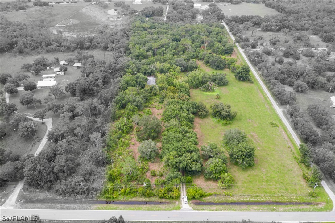 1745 County Road 731 Venus, FL 33960 - Photo 1 of 45 a view of a yard