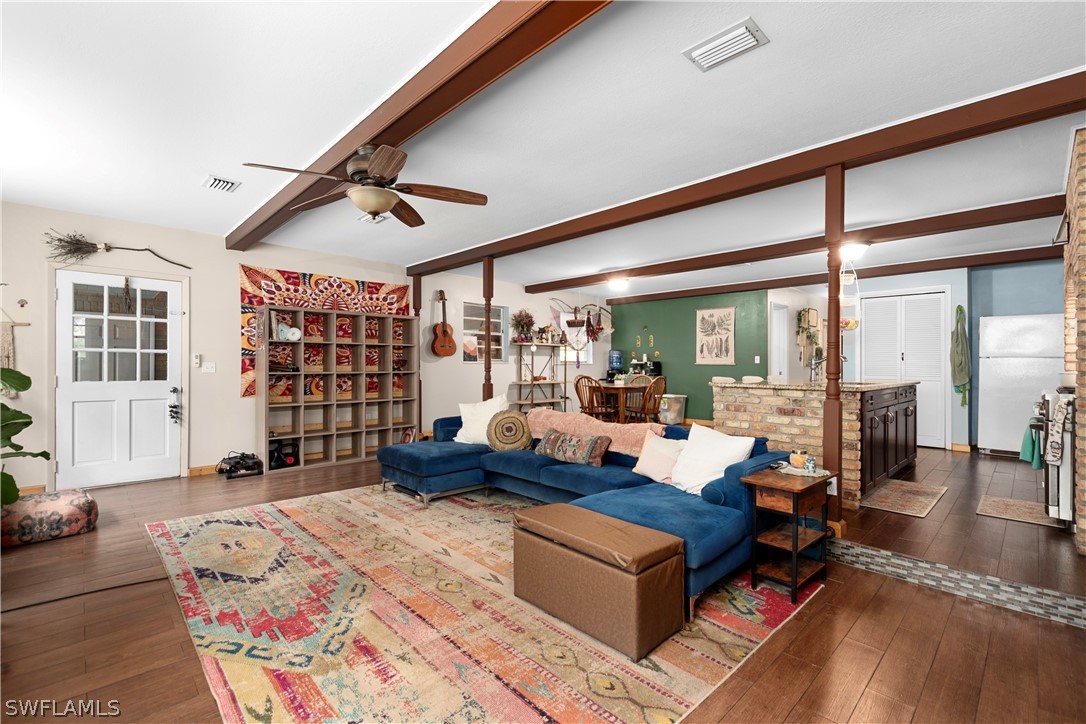 1745 County Road 731 Venus, FL 33960 - Photo 18 of 45 a living room with furniture or couch and a large window