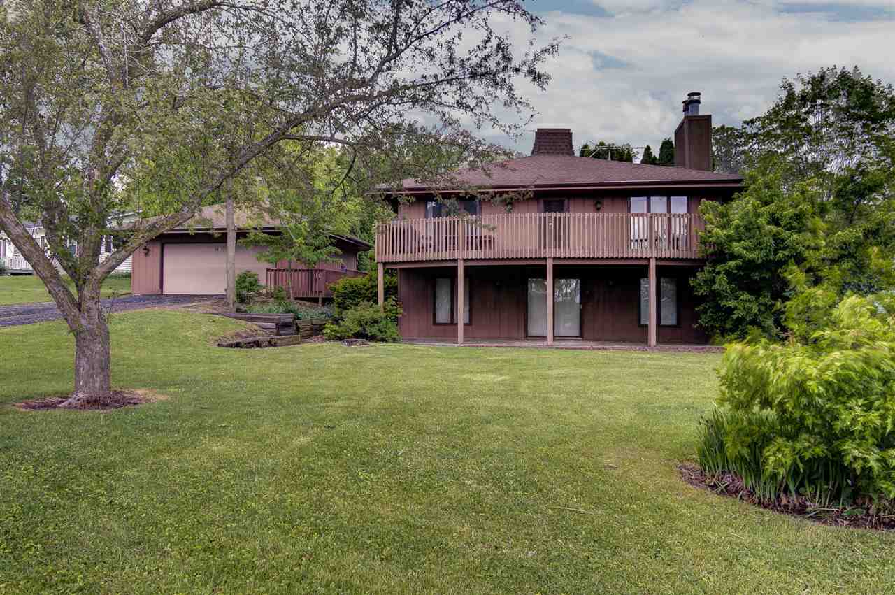 1962 Baintree Road Lake Summerset, IL 61019 - Photo 1 of 25 a view of an house with backyard and a tree