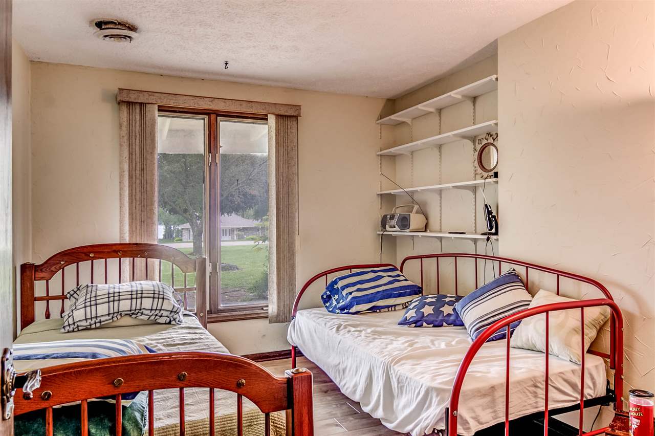 1962 Baintree Road Lake Summerset, IL 61019 - Photo 13 of 25 a bedroom with a bed and a window