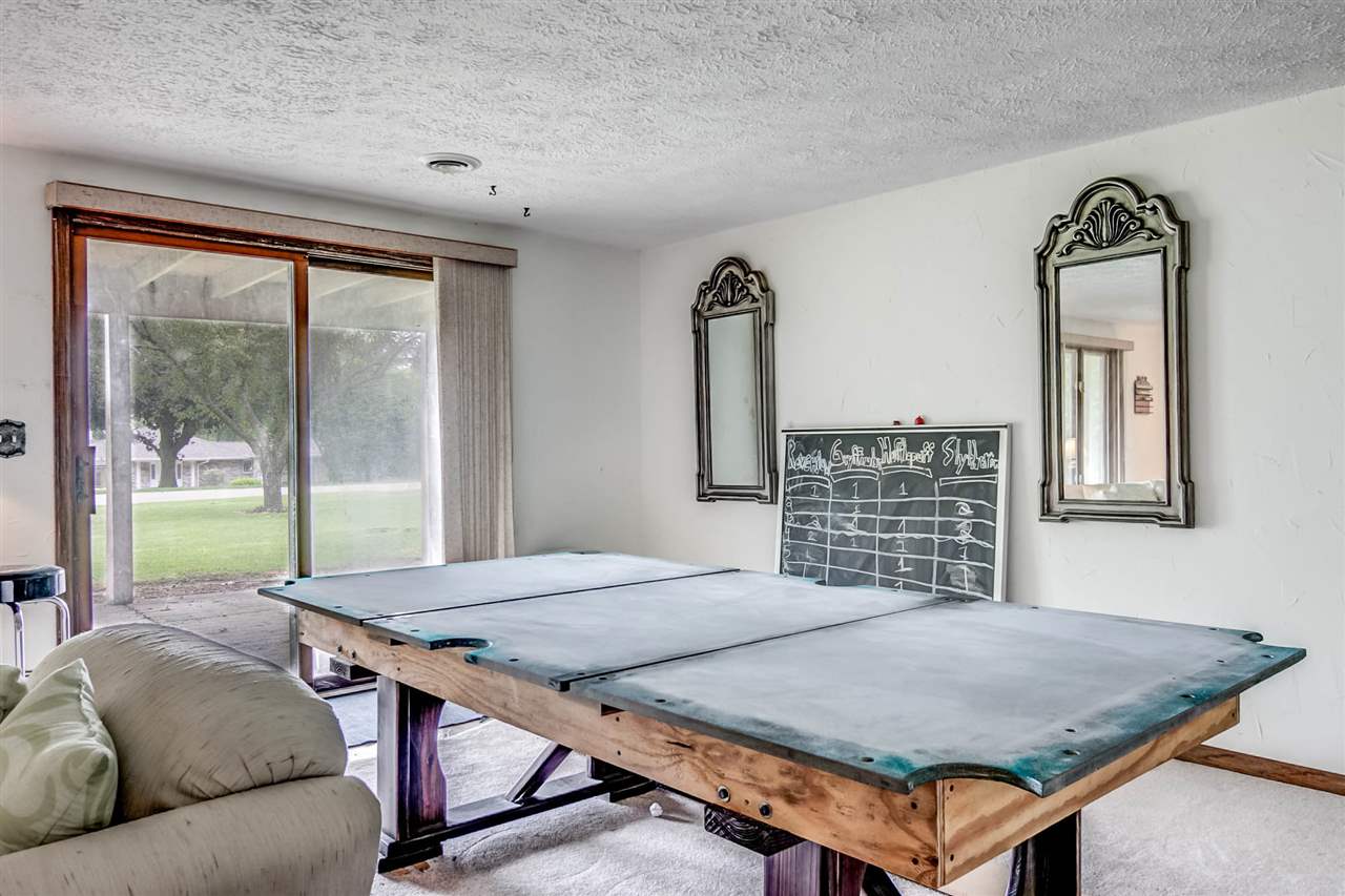 1962 Baintree Road Lake Summerset, IL 61019 - Photo 15 of 25 a living room with furniture pool table and a window