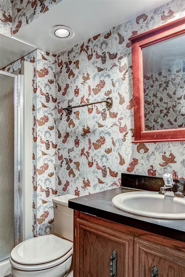 1962 Baintree Road Lake Summerset, IL 61019 - Photo 19 of 25 a bathroom with a sink and a mirror