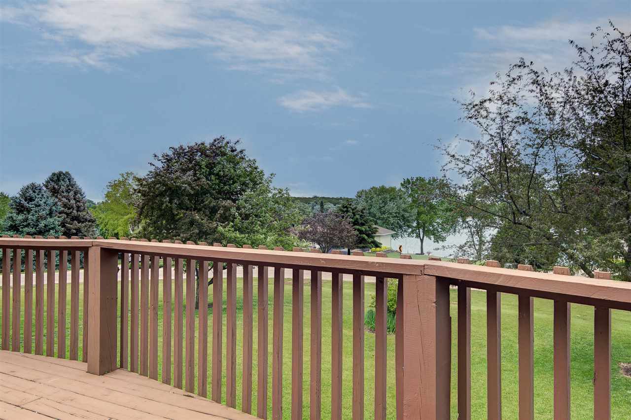 1962 Baintree Road Lake Summerset, IL 61019 - Photo 23 of 25 a balcony with wooden floor and fence