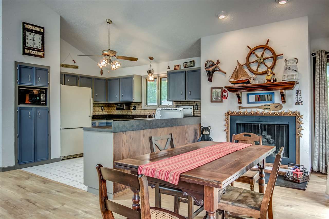 1962 Baintree Road Lake Summerset, IL 61019 - Photo 6 of 25 a open kitchen with stainless steel appliances granite countertop a stove and a refrigerator