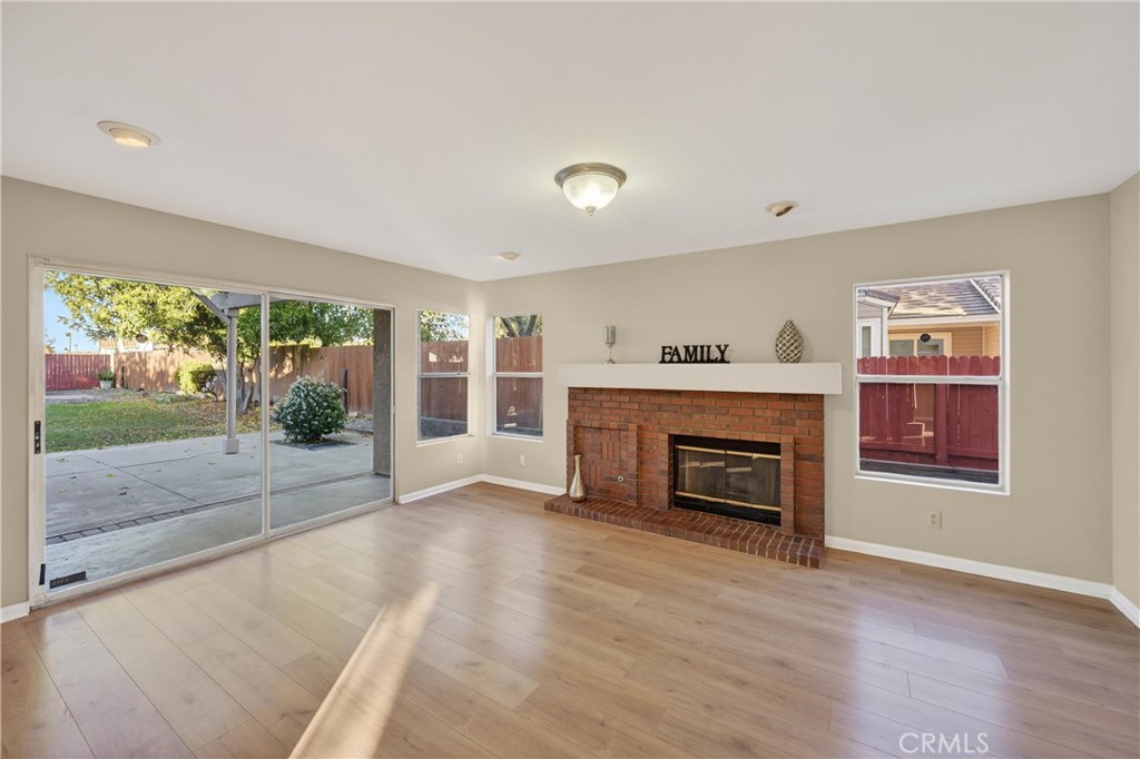 19540 Chinotto Lane Riverside, CA 92508 - Photo 20 of 69 Spacious family room with a cozy fireplace