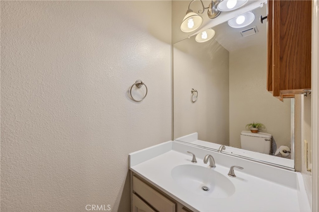 19540 Chinotto Lane Riverside, CA 92508 - Photo 24 of 69 Convenient downstairs powder room
