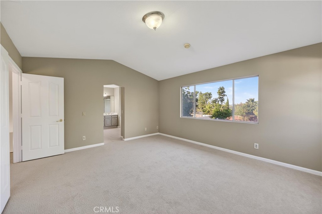 19540 Chinotto Lane Riverside, CA 92508 - Photo 44 of 69 Large primary bedroom with an open, airy design