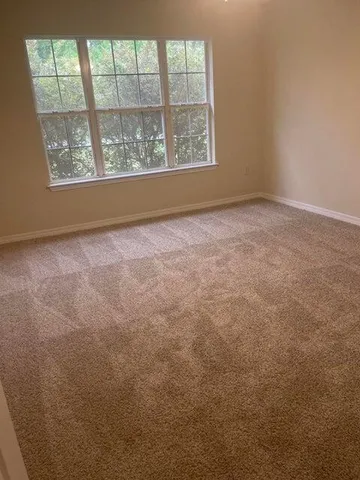 an empty room with a window