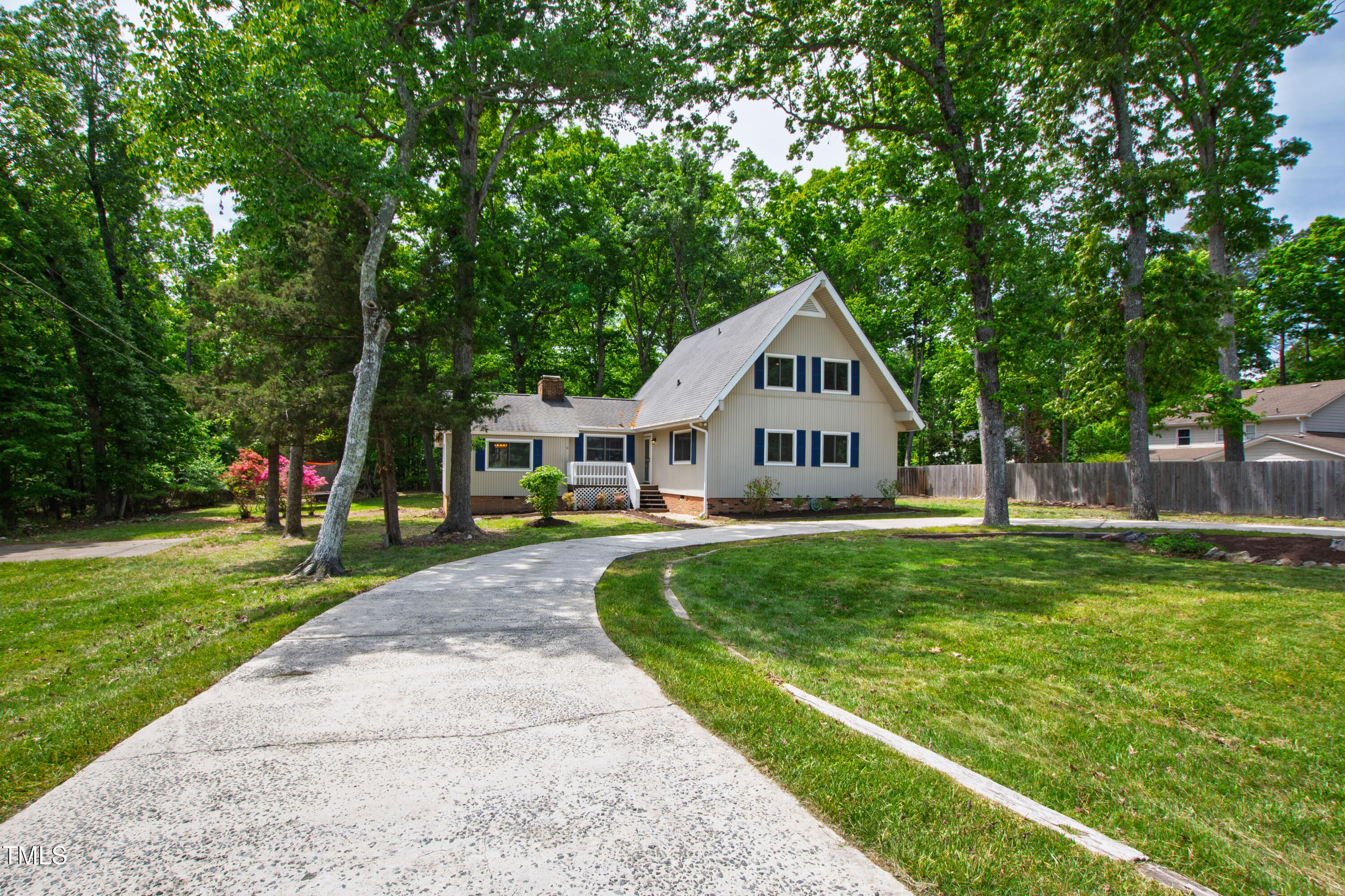1915 Redding Lane Durham, NC 27712 - Photo 1 of 45 a front view of a house with yard and green space