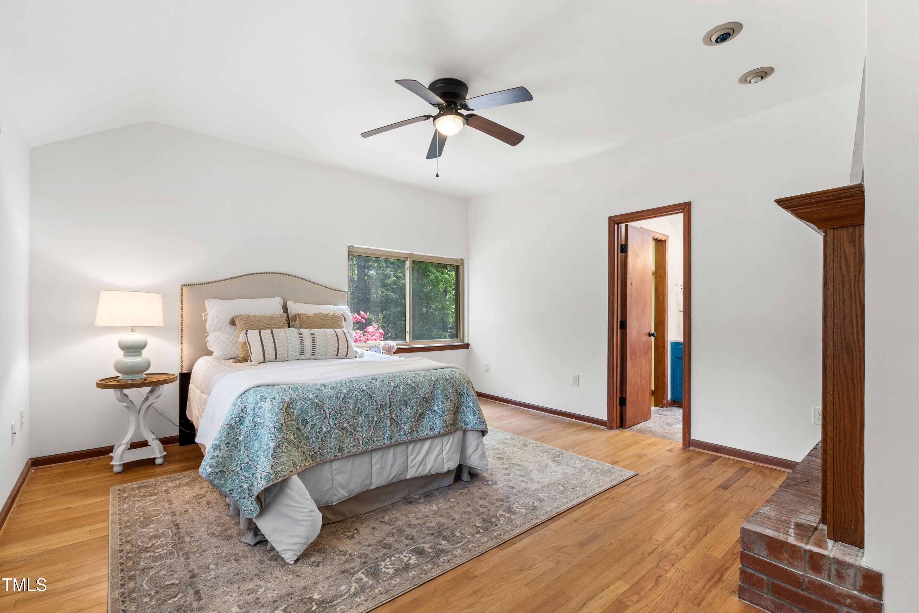 1915 Redding Lane Durham, NC 27712 - Photo 13 of 45 a bedroom with a bed and window