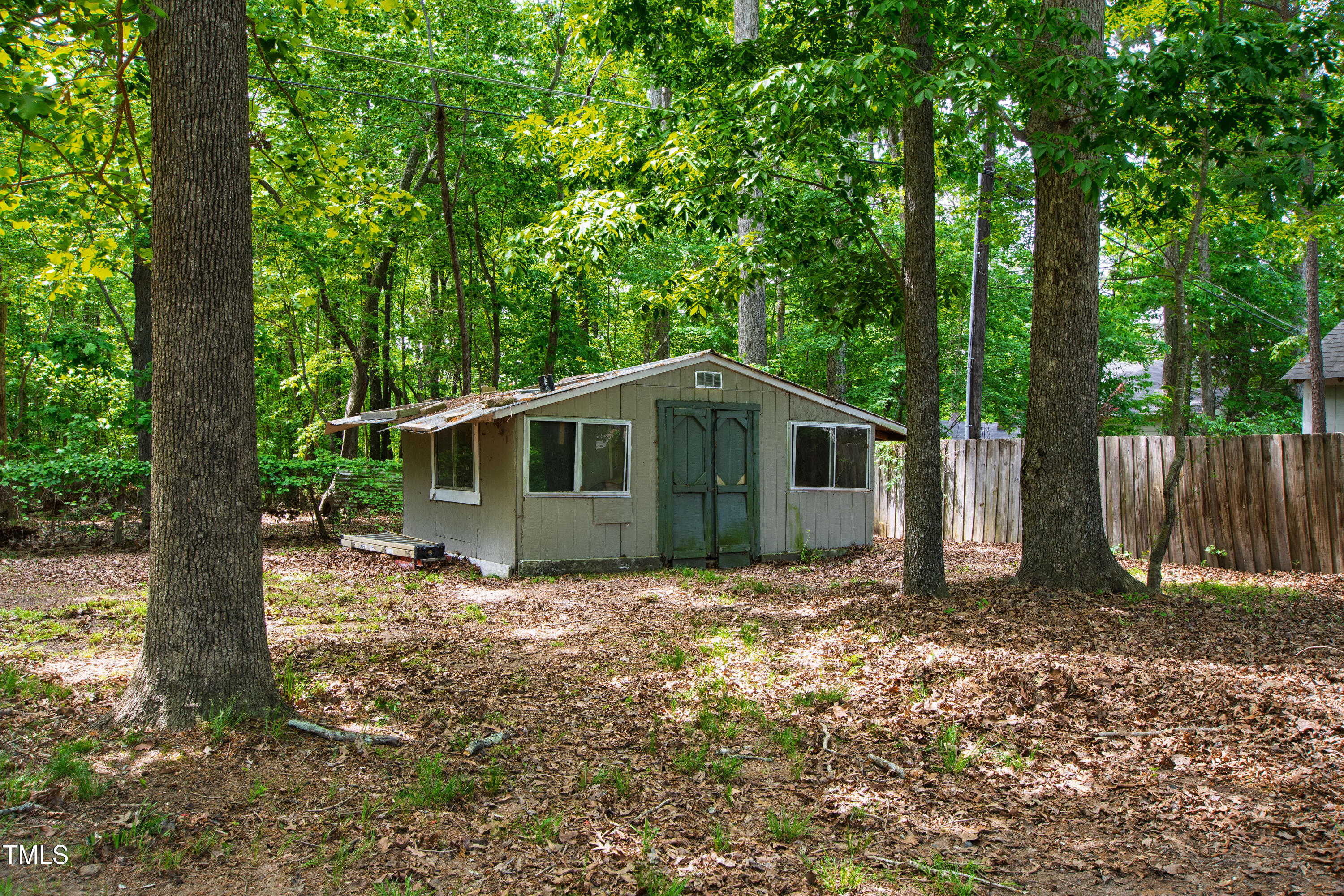 1915 Redding Lane Durham, NC 27712 - Photo 17 of 45 a house with trees in the background