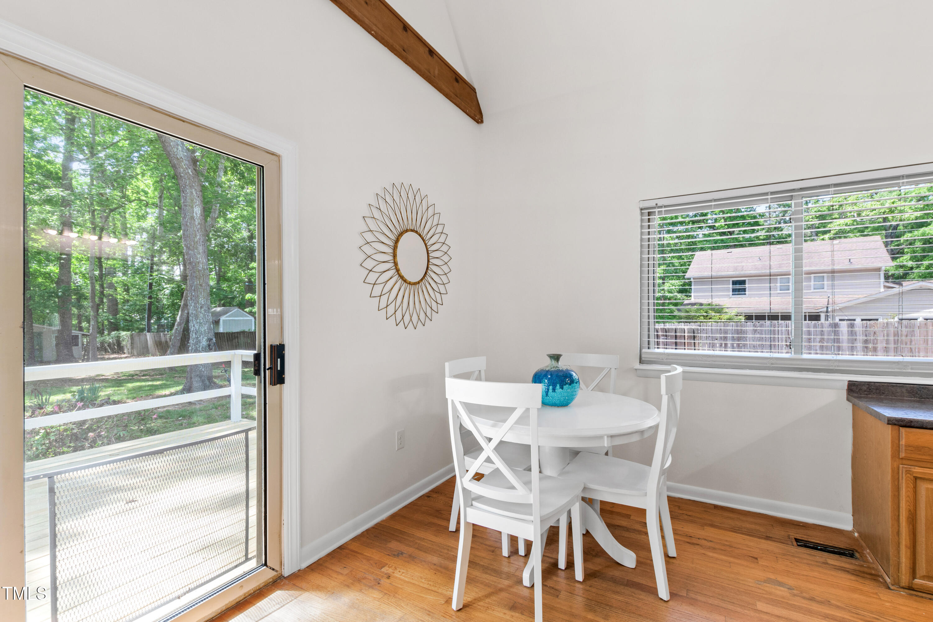 1915 Redding Lane Durham, NC 27712 - Photo 22 of 45 a dining room with furniture window wooden floor