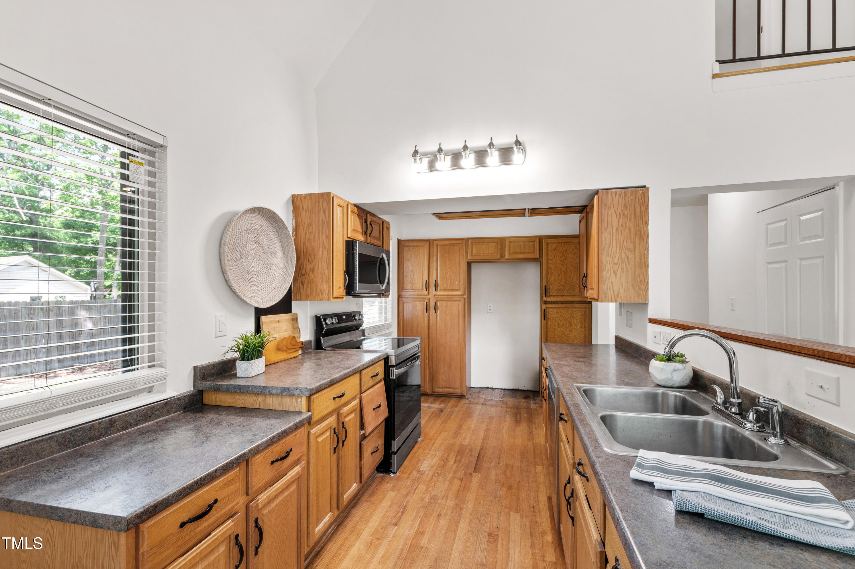 1915 Redding Lane Durham, NC 27712 - Photo 23 of 45 a kitchen with sink and window