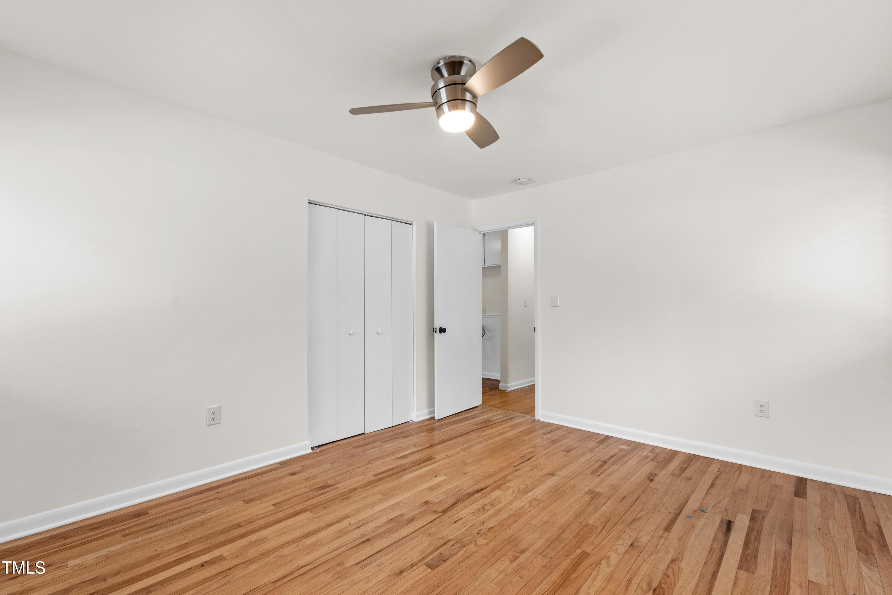 1915 Redding Lane Durham, NC 27712 - Photo 30 of 45 a view of empty room with wooden floor