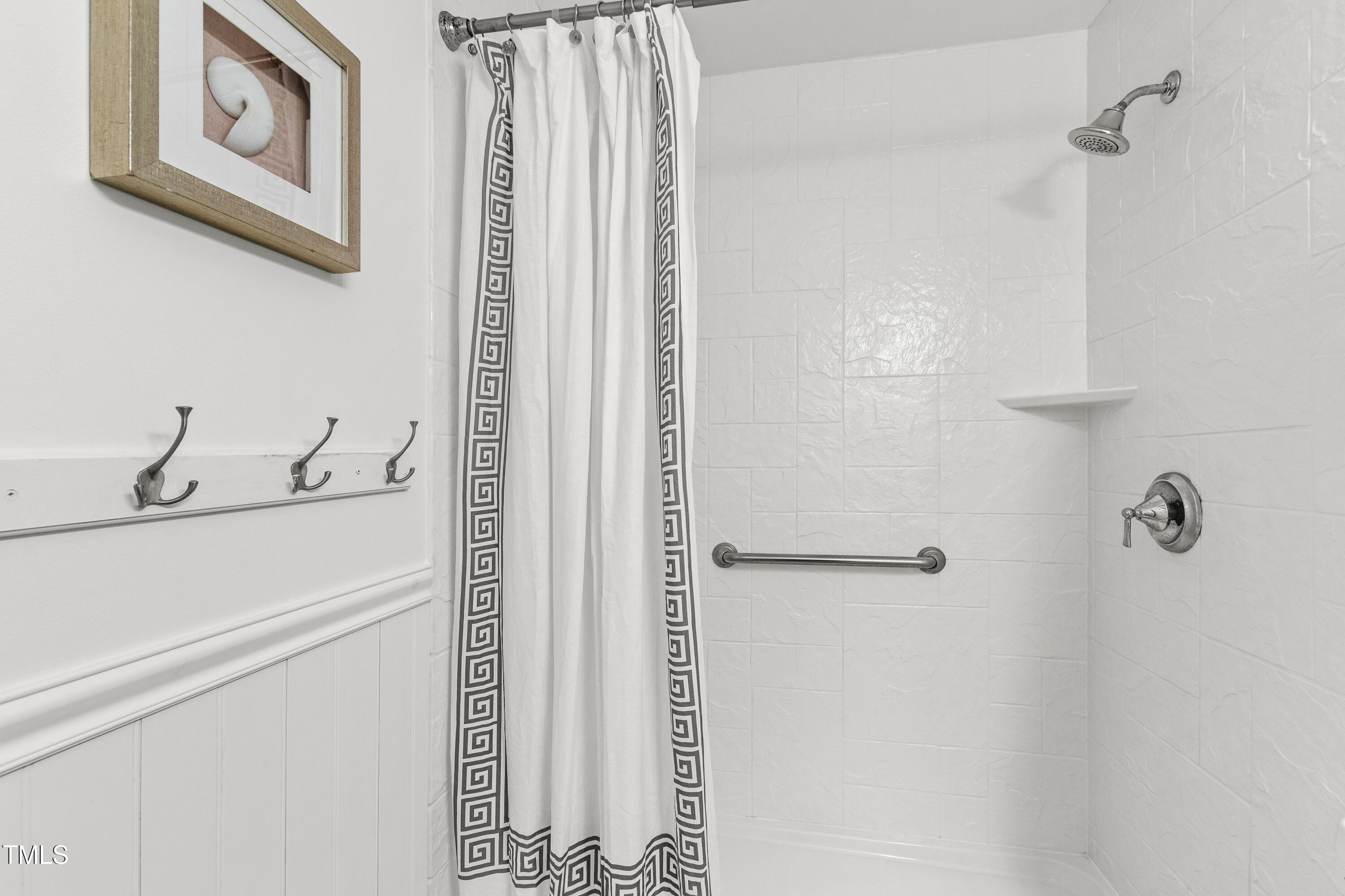 1915 Redding Lane Durham, NC 27712 - Photo 36 of 45 a bathroom with a shower and a sink