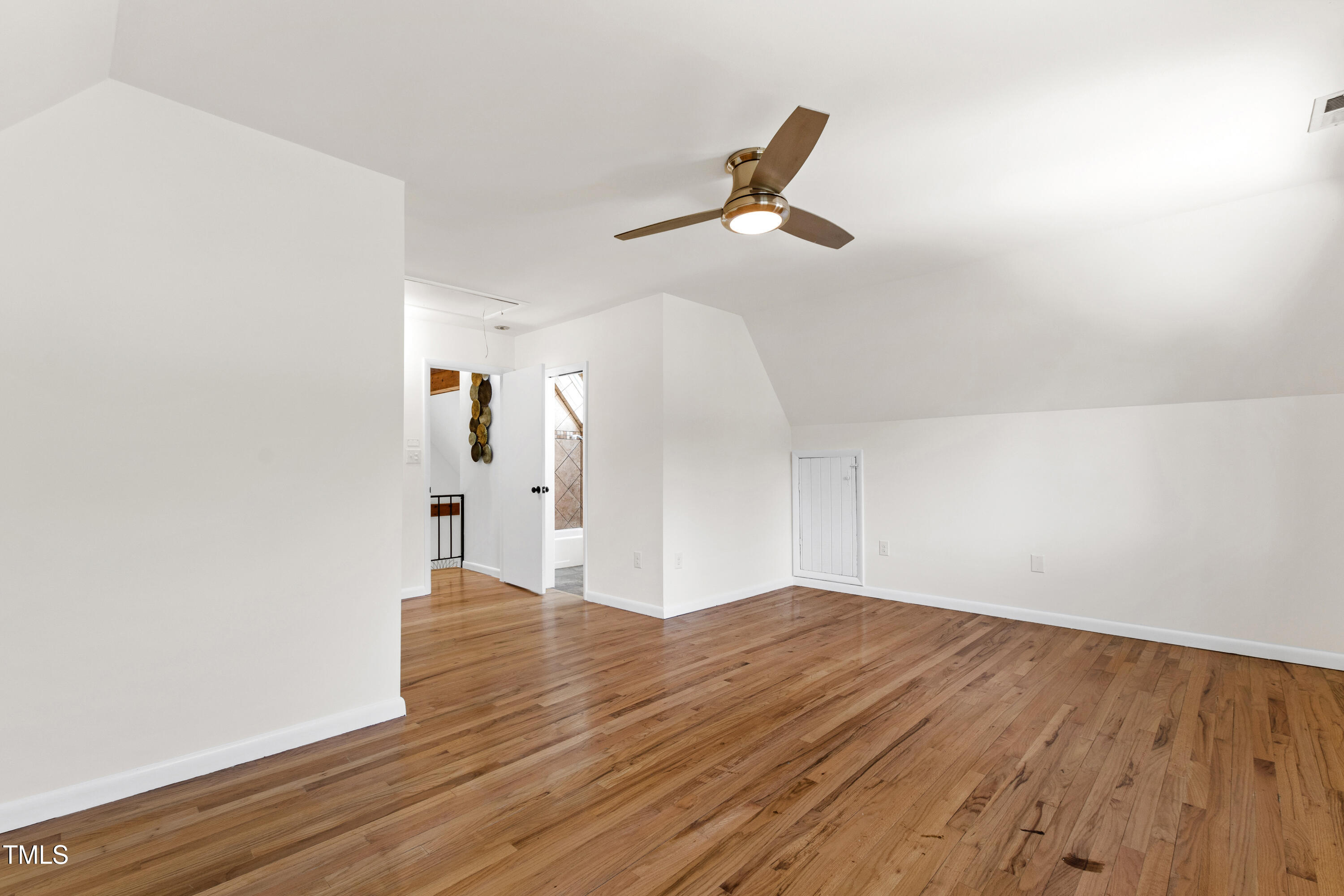 1915 Redding Lane Durham, NC 27712 - Photo 39 of 45 a view of empty room with wooden floor