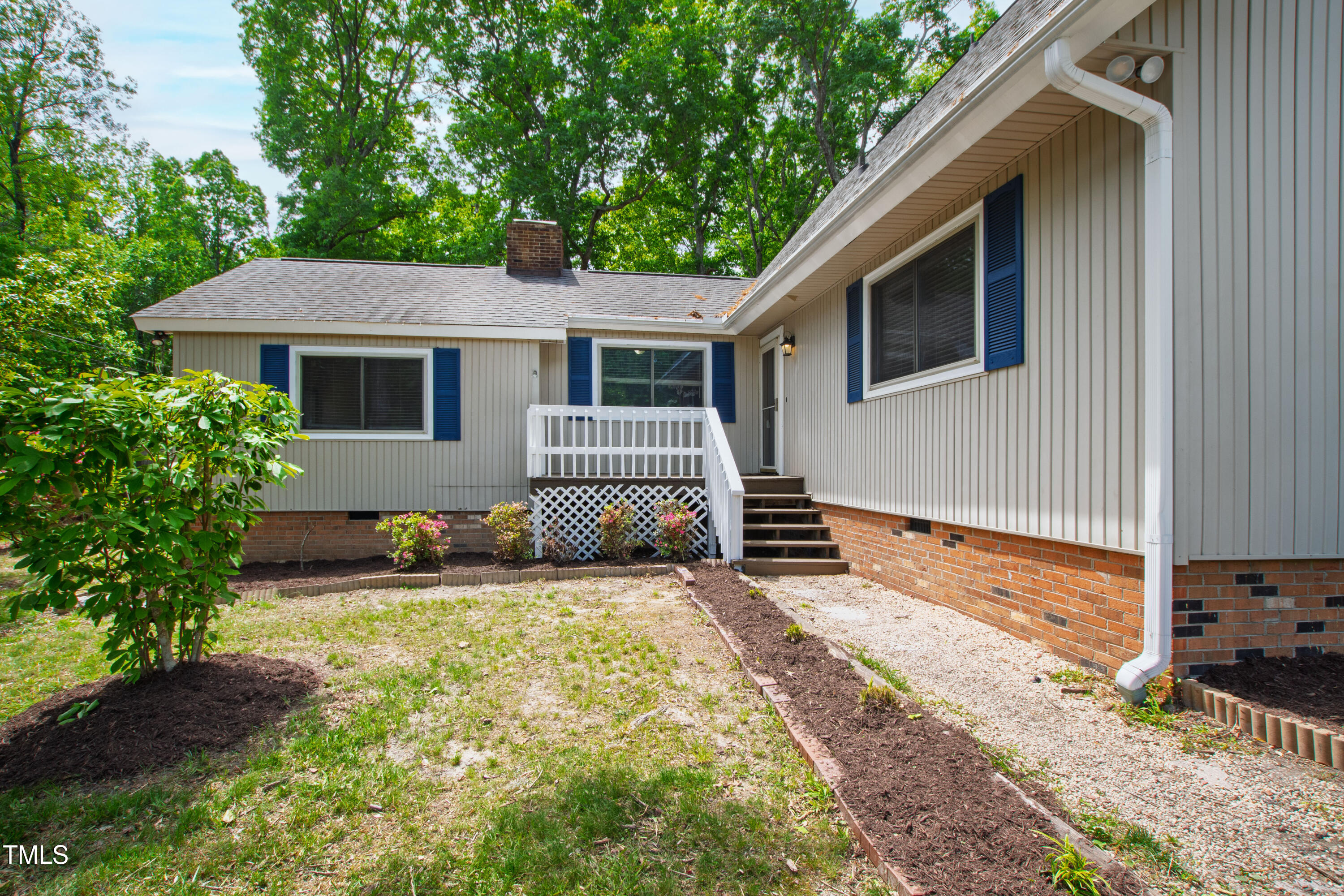 1915 Redding Lane Durham, NC 27712 - Photo 4 of 45 a view of a house with backyard and sitting area