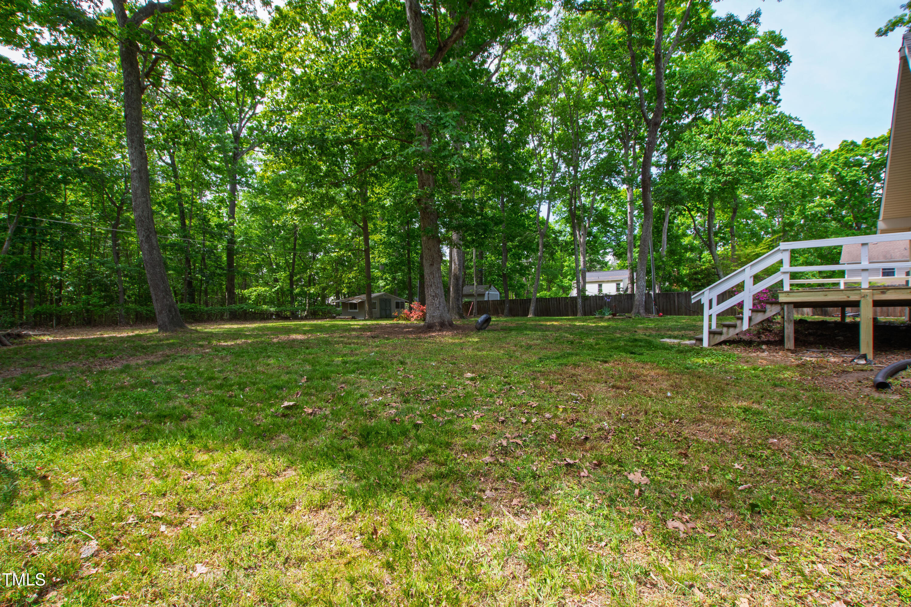 1915 Redding Lane Durham, NC 27712 - Photo 43 of 45 a view of outdoor space with deck and yard