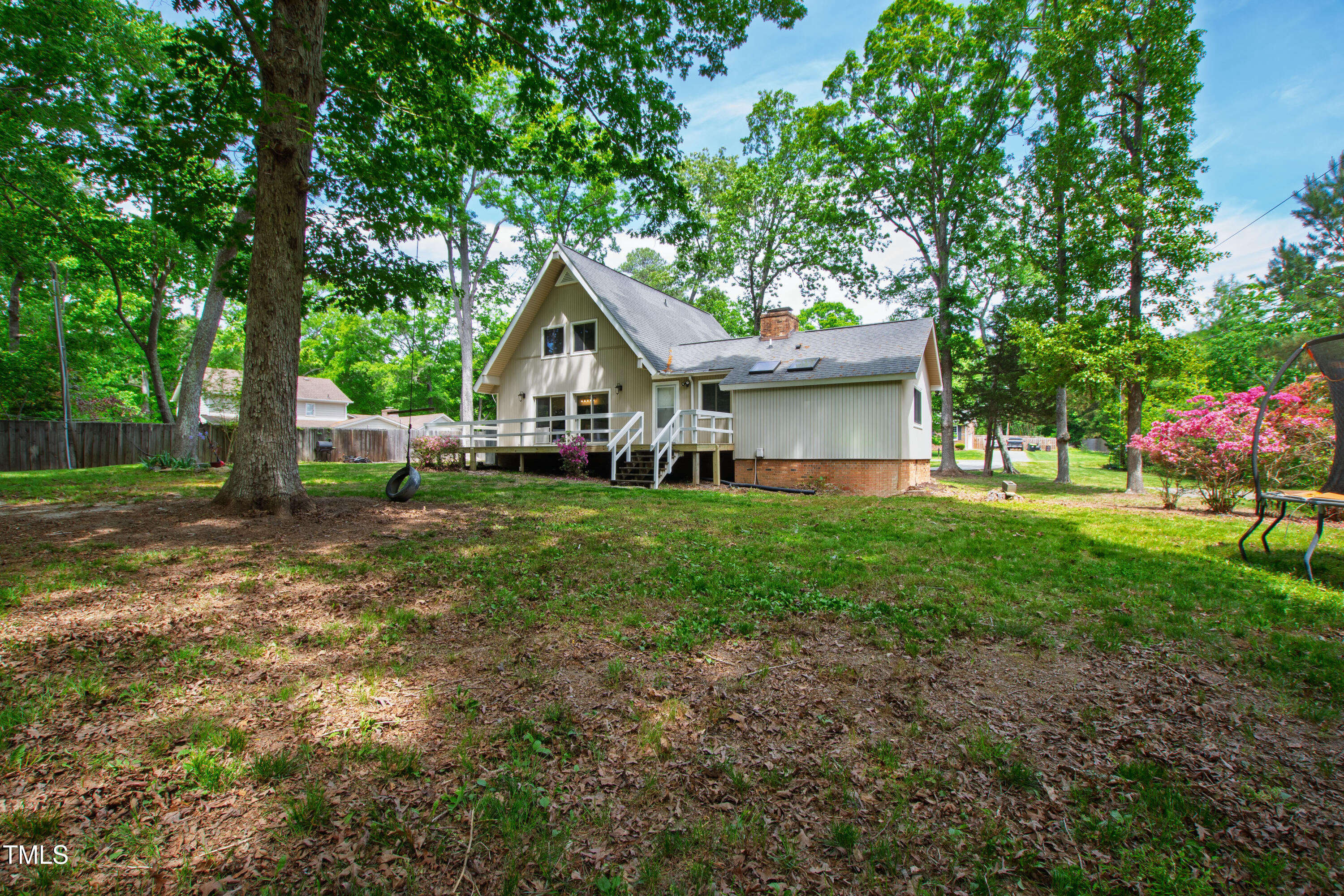 1915 Redding Lane Durham, NC 27712 - Photo 44 of 45 a view of an house with backyard space and garden