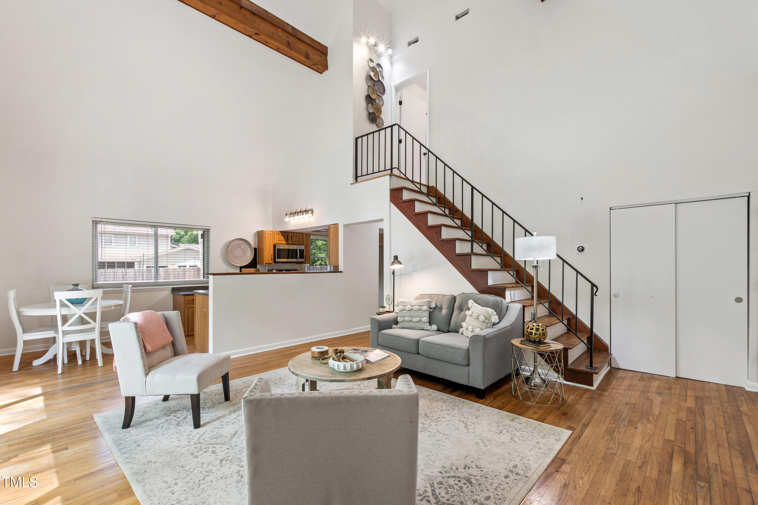 1915 Redding Lane Durham, NC 27712 - Photo 5 of 45 a living room with furniture and a wooden floor