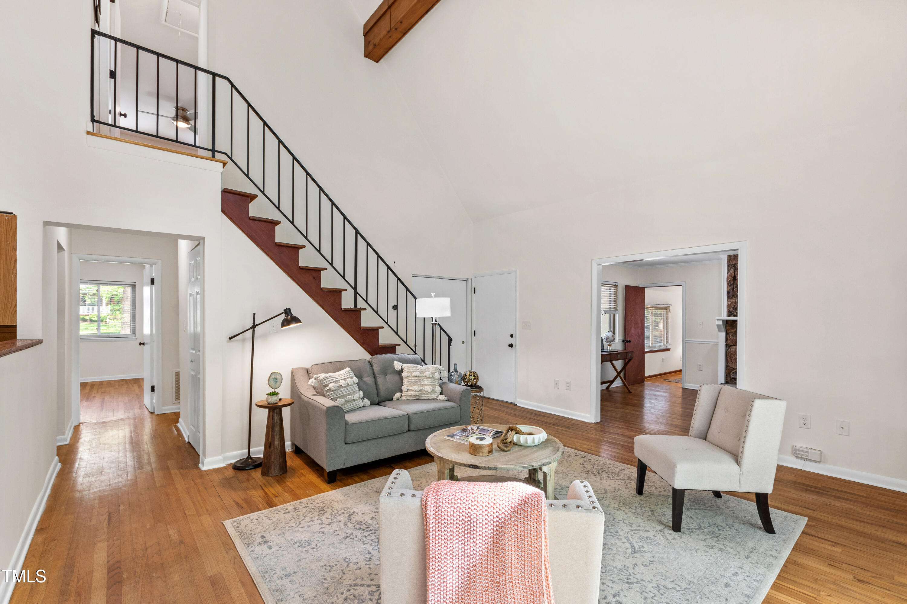 1915 Redding Lane Durham, NC 27712 - Photo 7 of 45 a living room with furniture and a rug