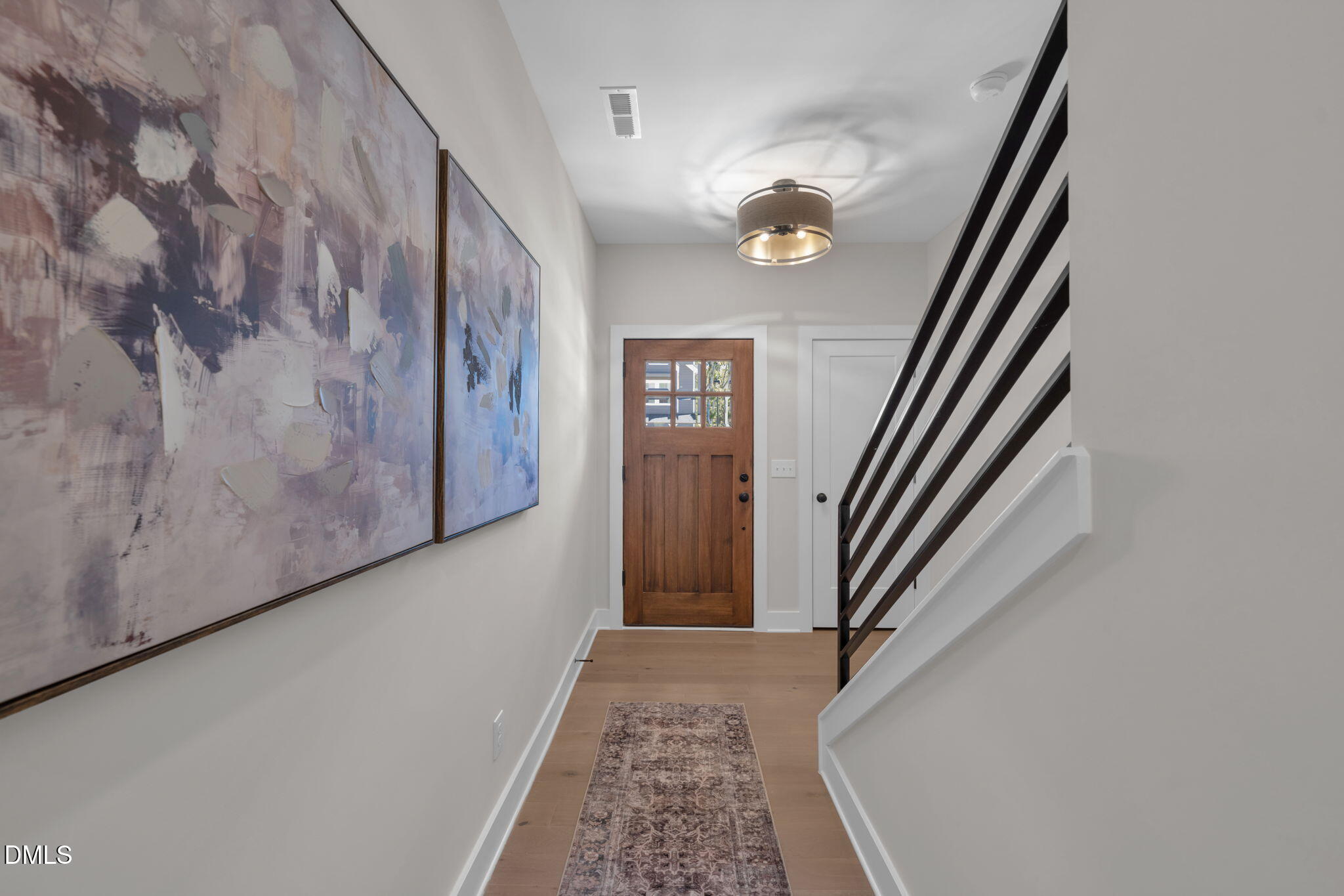 992 Double Helix Road Apex, NC 27523 - Photo 5 of 33 a view of staircase with rug