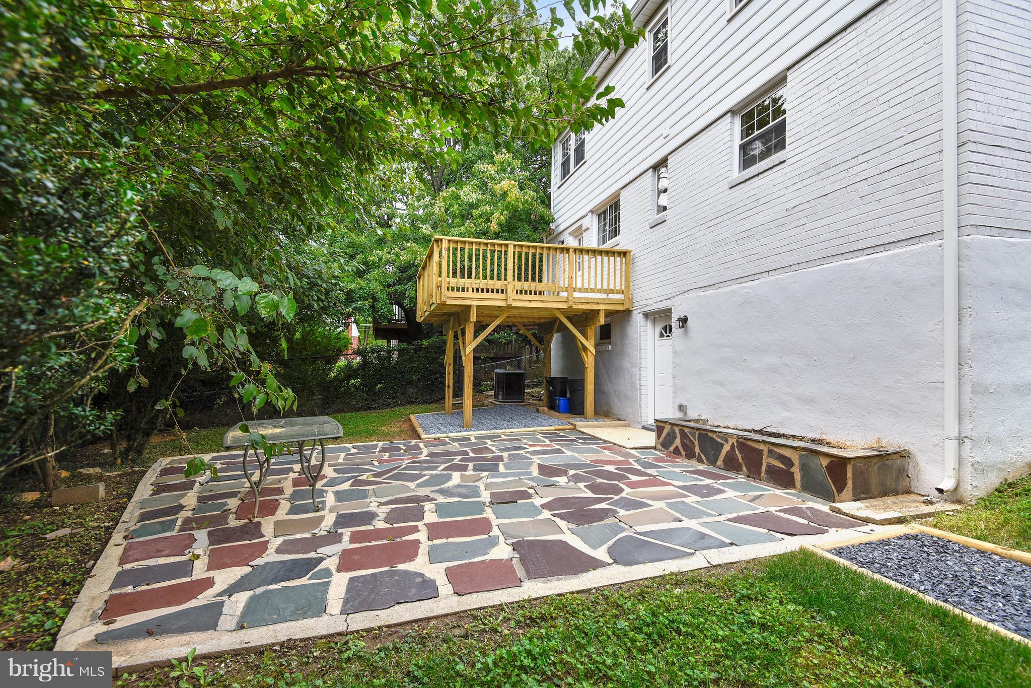 3902 Randolph Road Wheaton, MD 20902 - Photo 27 of 30 a front view of a house with a yard
