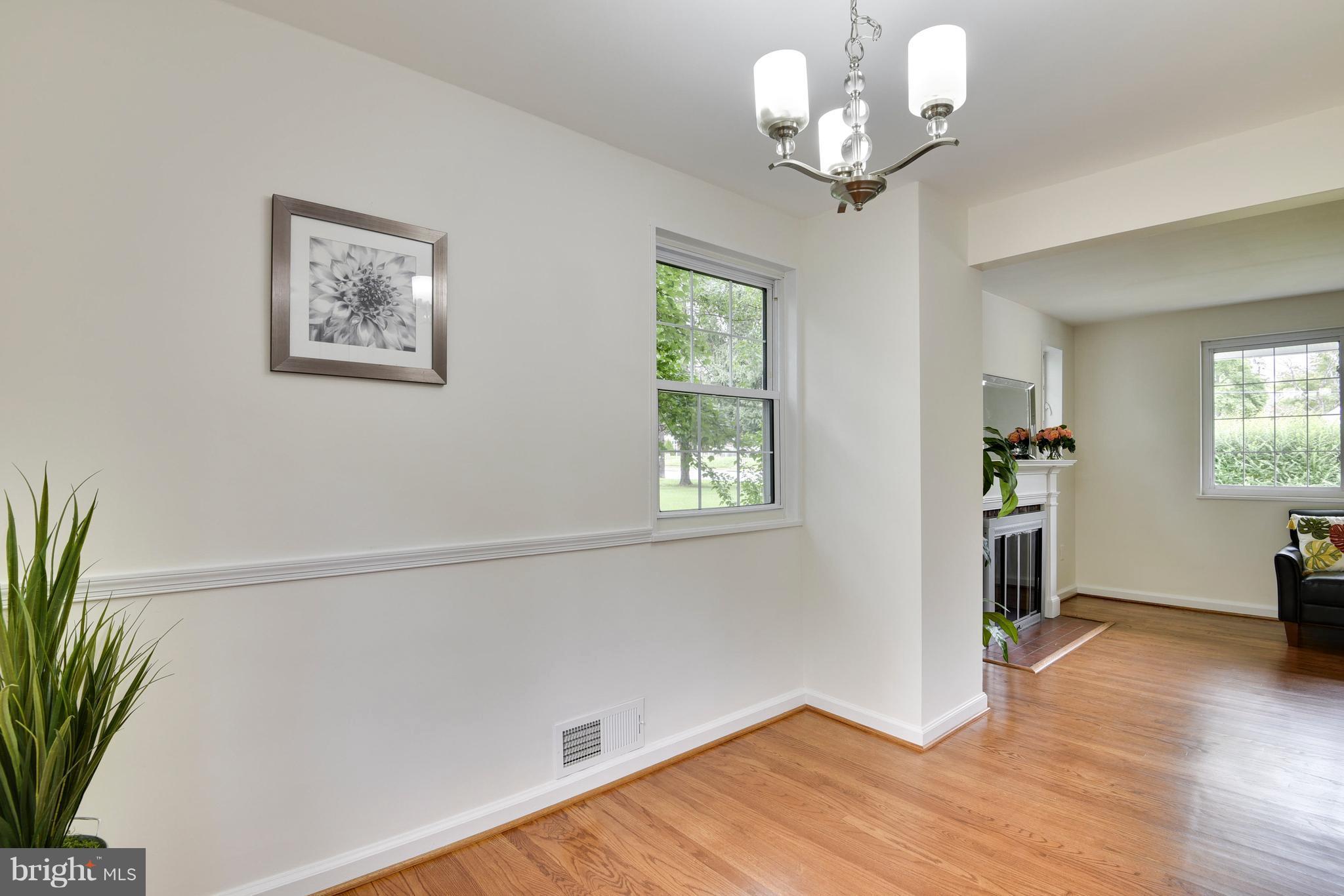 3902 Randolph Road Wheaton, MD 20902 - Photo 7 of 30 a view of livingroom with hardwood floor and hallway