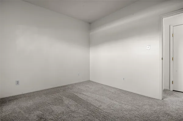 an empty room with an entryway