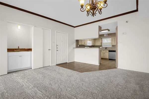 a view of a kitchen with a sink
