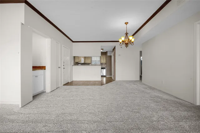 a view of a kitchen with a sink and cabinet area
