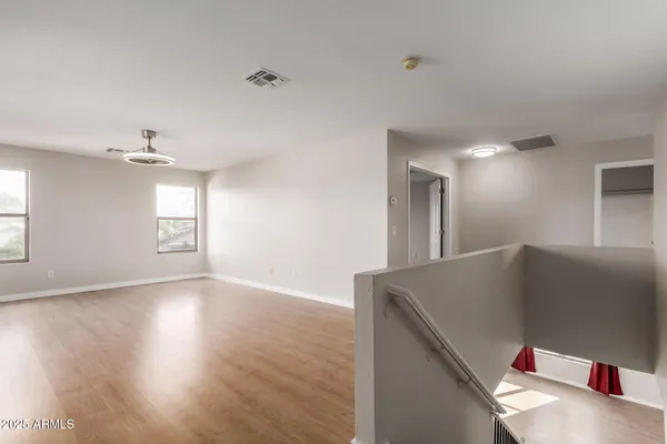 a view of livingroom and hardwood floor