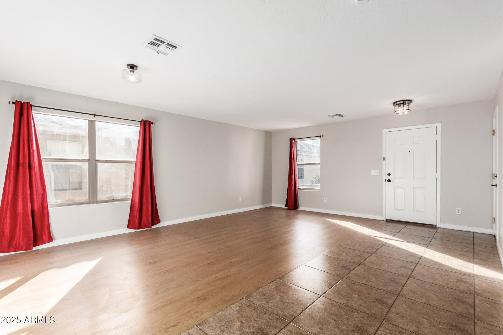 631 South Colonial Court Gilbert, AZ 85296 - Photo 5 of 27 a view of an empty room with a window