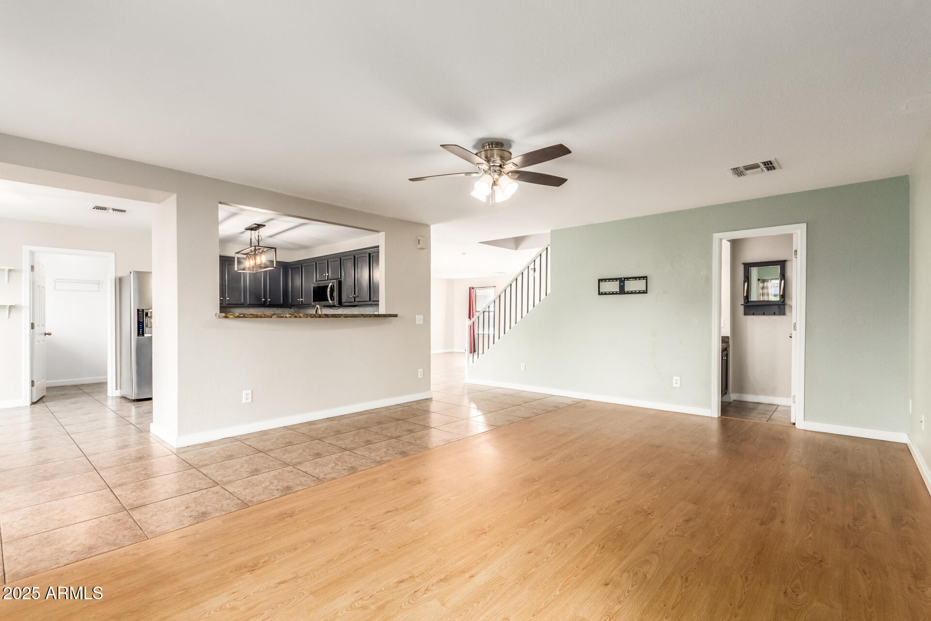 631 South Colonial Court Gilbert, AZ 85296 - Photo 8 of 27 a view of a livingroom with a flat screen tv