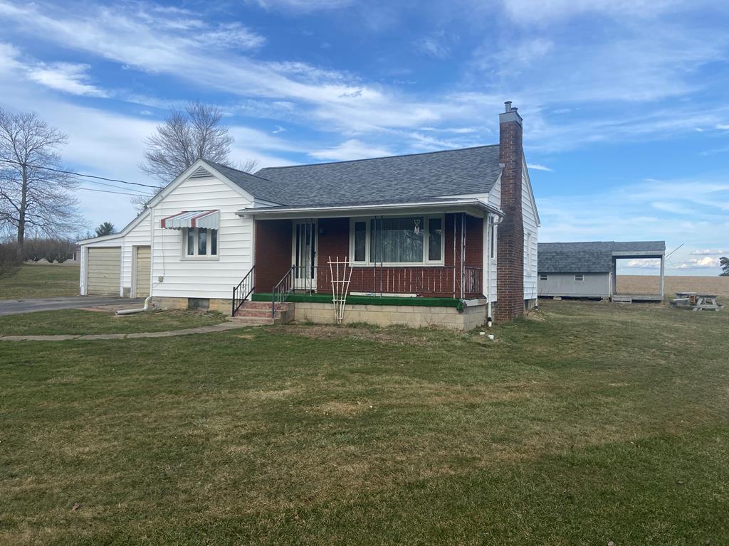 767 Lawsonham Road Rimersburg, PA 16248 - Photo 1 of 23 a front view of a house with a garden