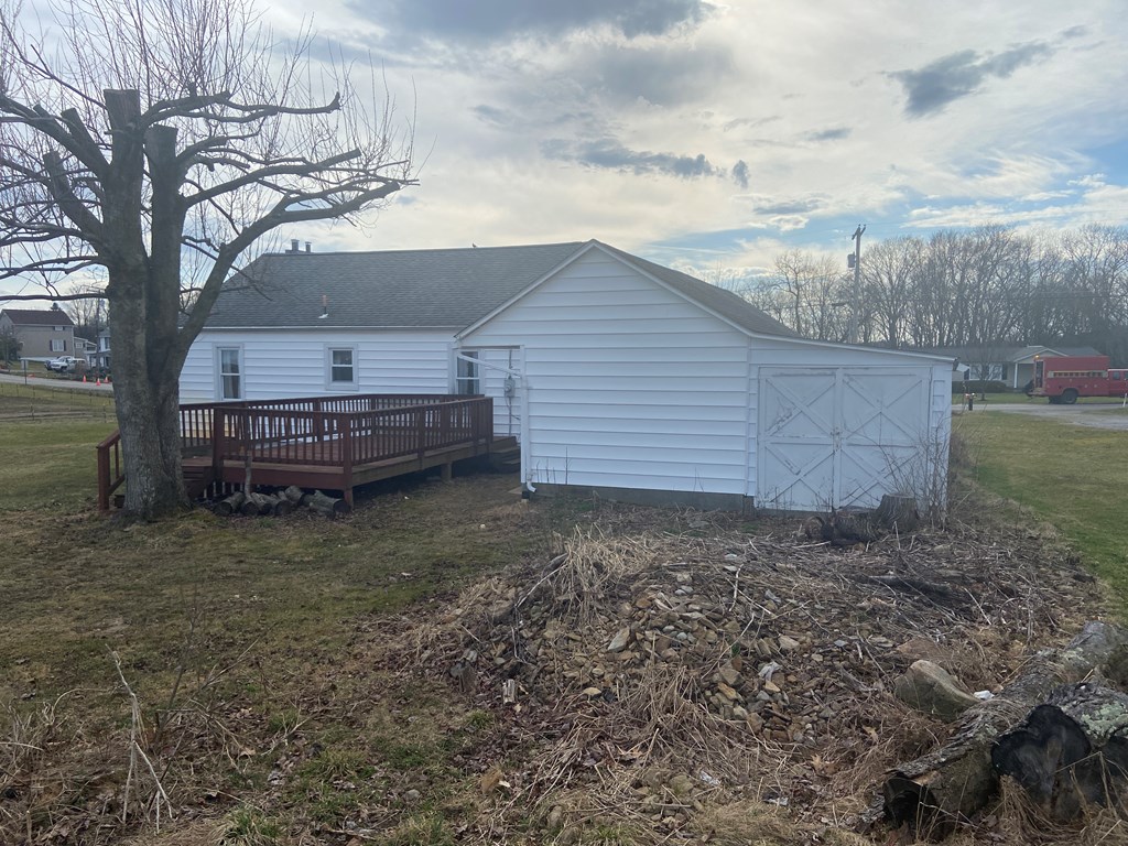 767 Lawsonham Road Rimersburg, PA 16248 - Photo 15 of 23 a view of backyard with barn and a large tree