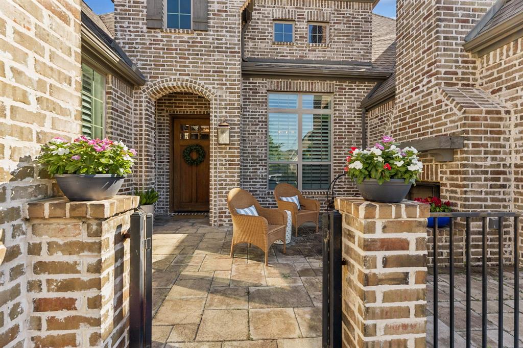 3912 Marble Hill Road Frisco, TX 75034 - Photo 2 of 40 Courtyard with fireplace