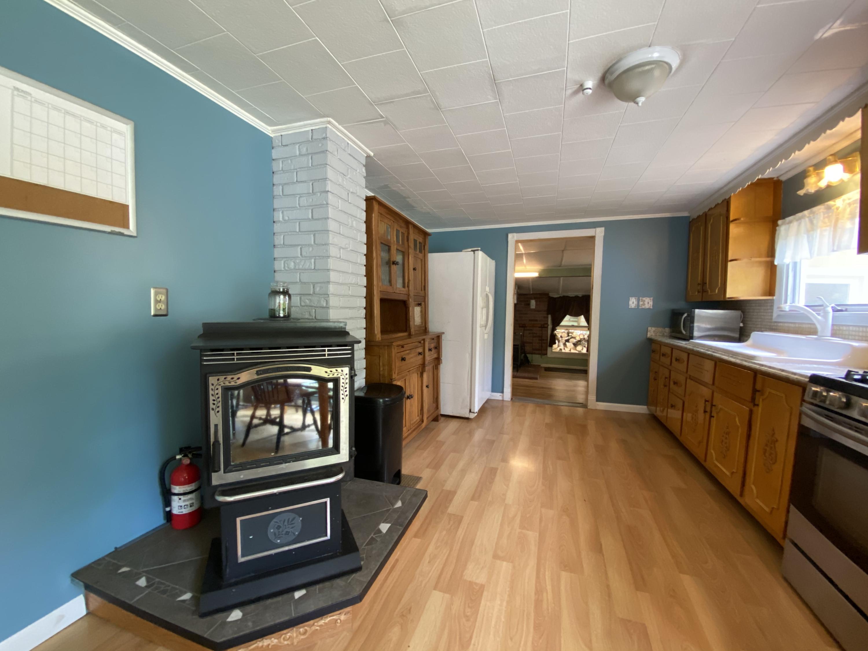 1749 Greenfield Road Greenbush, ME 04418 - Photo 14 of 48 Pellet Stove