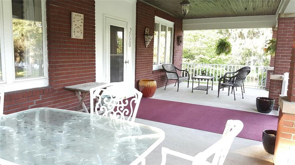 260 Vogel Road Butler, PA 16002 - Photo 2 of 24 A covered front porch carries you to the front entry.