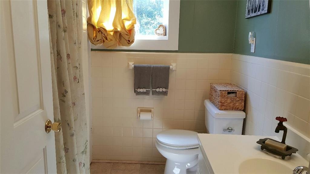 260 Vogel Road Butler, PA 16002 - Photo 16 of 24 Another bathroom in the home is finished with tile floors.