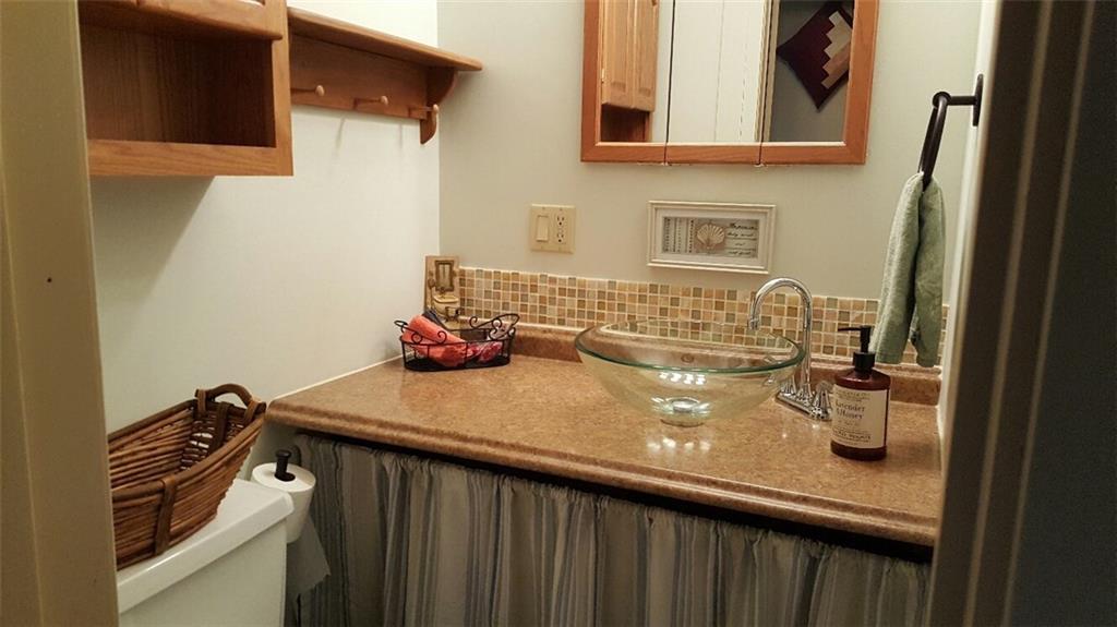 260 Vogel Road Butler, PA 16002 - Photo 17 of 24 The partial bath is streamlined with style and modernity.