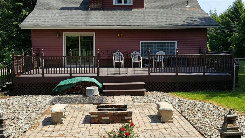 260 Vogel Road Butler, PA 16002 - Photo 23 of 24 At the back of the house is an expansive fenced-in deck that can accommodate any number of guests.