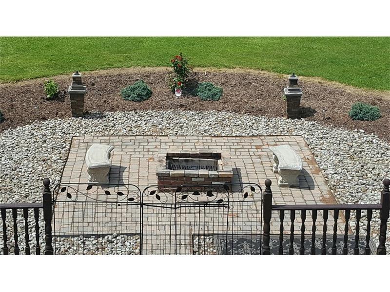 260 Vogel Road Butler, PA 16002 - Photo 24 of 24 Accompanying the lawn's recreational space is a courtyard with its own fire pit.
