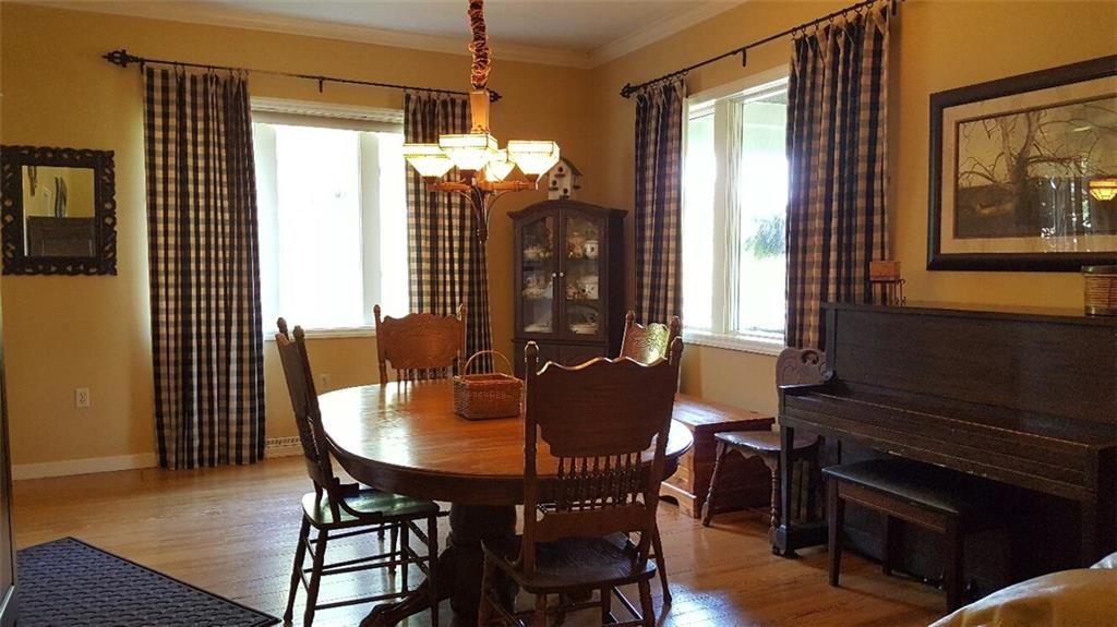 260 Vogel Road Butler, PA 16002 - Photo 8 of 24 Completing this elegant formal dining room is polished wall-to-wall hardwood flooring.